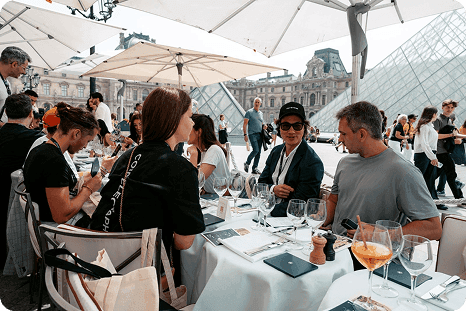Guests at the media lunch with the pyramid behind them
